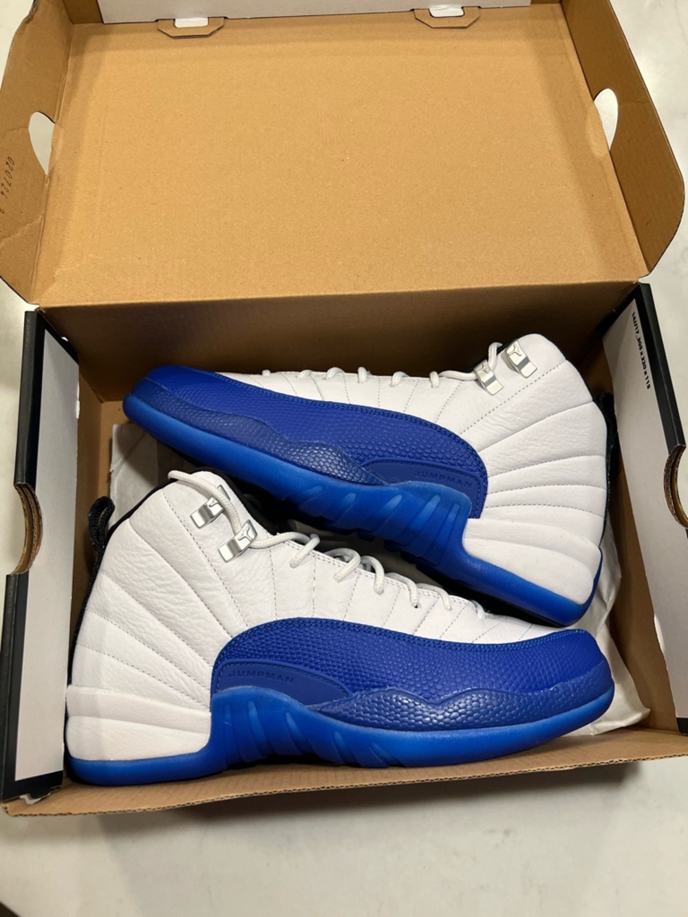 Jordan White and Royal Blue Retro 12 Sneakers - Picture 3 of 13